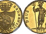 a gold sovereign coin with an image of a man holding a sword and shield