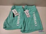 a close up of a pair of shorts with tags on them