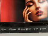 a picture of a woman on the screen of a tv
