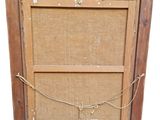an old wooden picture frame with a rope hanging from it ' s side