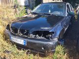 a picture of a car that has crashed into a house