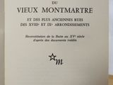 an open book with a black and white image of the title of the book