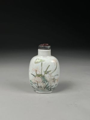 an image of a white vase with flowers on it on a table