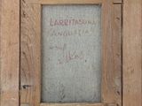 an old picture of a picture frame with writing on it