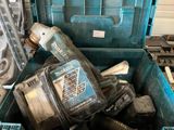 a blue tool box with tools inside of it