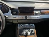 a car dashboard with a radio and a steering wheel