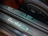 a close up of a car door handle with the word tuffo written on it