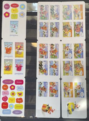 a lot of stickers that are on the table