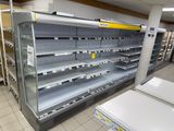 many empty shelves in a store that are empty