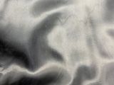 une image montrant un gros plan d'un drap de lit