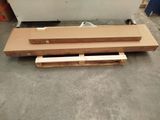 two pieces of wood that are laying on the floor