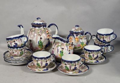 a group of tea and coffee cups and saucers