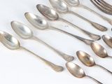a lot of spoons and spoon spoons on the table