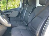 the interior of a van with black leather seats and a steering wheel