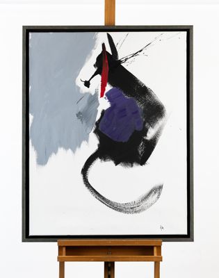 une photo d'un tableau posé sur un chevalet, avec un chat