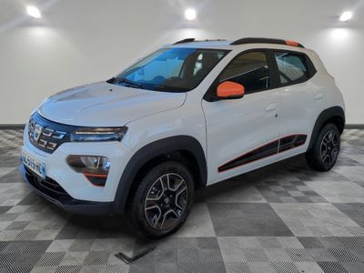 a white suv parked in a room with a checkered floor