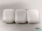 three white airpods sitting next to each other on top of a table