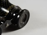 a close up of a pair of binoculars on a table
