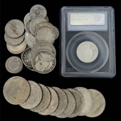 une image représentant un tas de pièces d'argent et un porte-monnaie