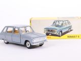 a toy car that is sitting in front of a box
