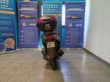 a motorcycle that is parked in front of a wall