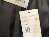 a close up of a label on a black jacket