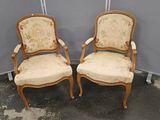 paire de chaises anciennes à accoudoirs rembourrés
