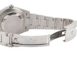 a close up of a watch on a bracelet on a white background