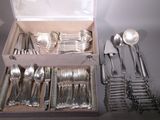 a box of silverware that is sitting on a table