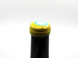 a bottle of wine that is sitting on a table