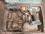 a tool box with tools in it on the floor