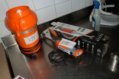 an orange fire extinguisher next to a box of toothpaste
