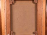 an old picture frame with a picture of a cat in it