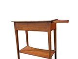 an image of a wooden table with a shelf underneath it