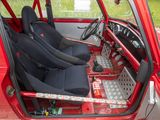 a red car with black seats in the back of it