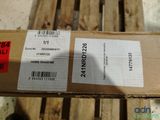 a box with a price label on it sitting on a pallet