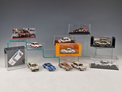 a lot of toy cars on display in a display case