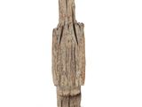 a small wooden sculpture of a person on a white background