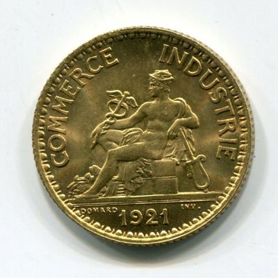 an image of a gold coin with a statue on it
