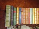 a lot of books that are sitting on a table