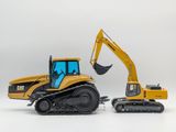 two toy vehicles that are sitting next to each other