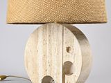 an elephant lamp with a beige shade on top of it