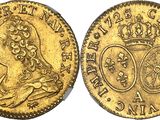 a gold sovereign coin with the image of queen elizabeth on it