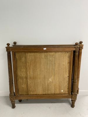 an old wooden cabinet with a mirror on top of it