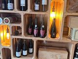 many bottles of wine on the shelves in the wine cellar