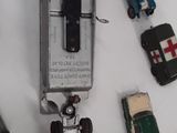 many different toy cars and trucks on a table