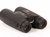 a close up of two binoculars on a white background
