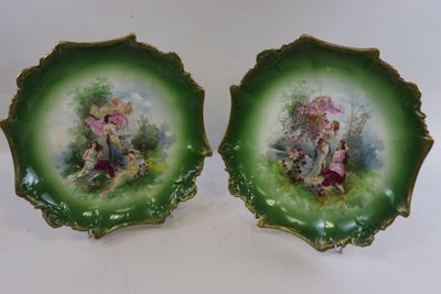 pair of antique hand painted porcelain plates depicting a fairy and a princess