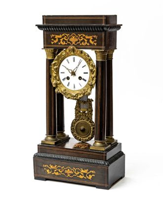 a clock that is sitting on top of a table