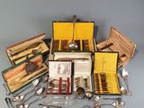 many different types of spoons and spoons in a box